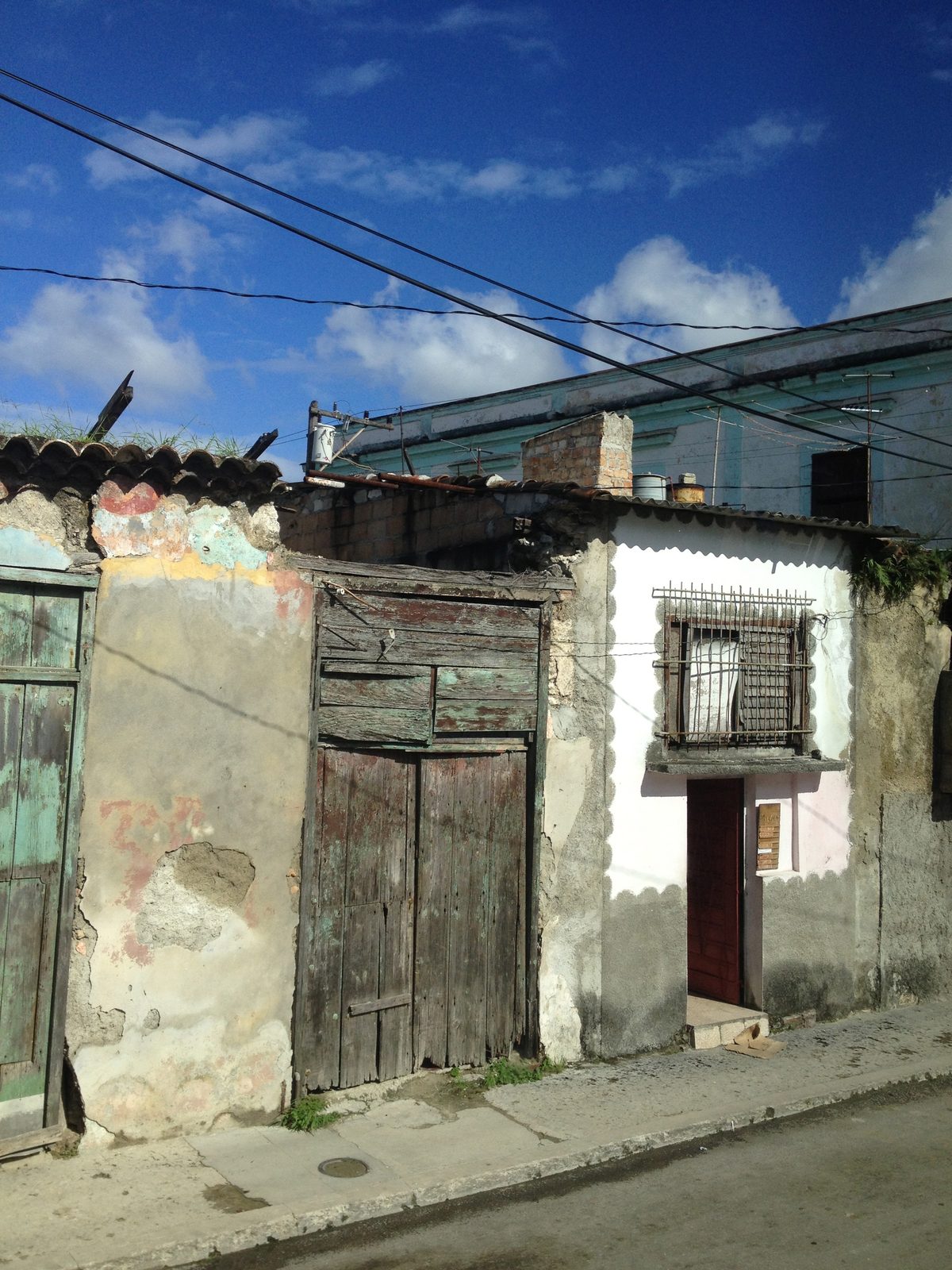 A fairly typical street scene in the non-tourist section of Havana